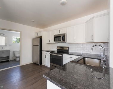 7105 Ridge Avenue - Photo Thumbnail 1