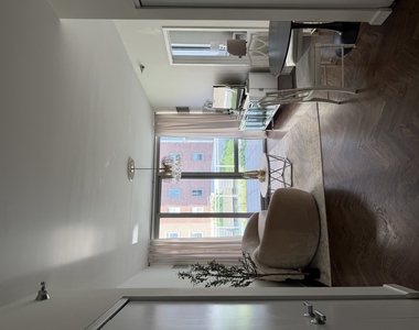 1 E 8th Street - Photo Thumbnail 1