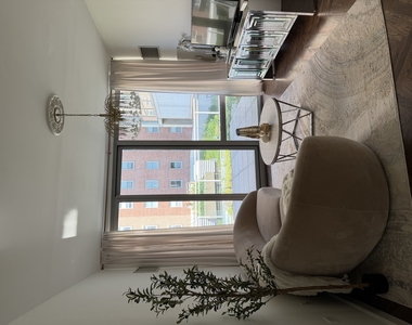 1 E 8th Street - Photo Thumbnail 2