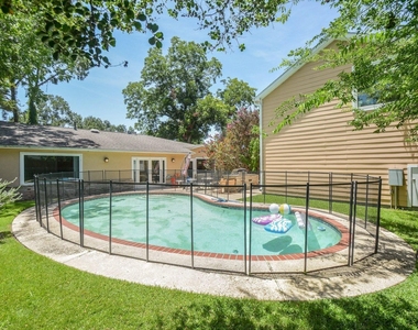 9906 Cedardale Drive - Photo Thumbnail 3