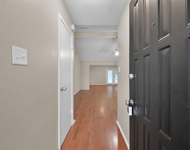 16858 Gleneagle Drive N - Photo Thumbnail 2