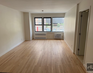 East 36 Street - Photo Thumbnail 2