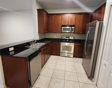 9333 Stone River Place - Photo Thumbnail 4