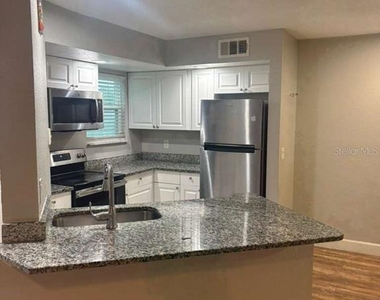 5701 Gatlin Avenue - Photo Thumbnail 4