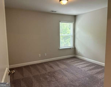 6207 Baltusrol Trace - Photo Thumbnail 24