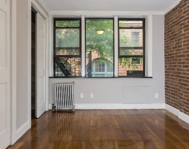 E 26th St. - Photo Thumbnail 4