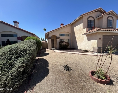 11322 W Alice Avenue - Photo Thumbnail 2