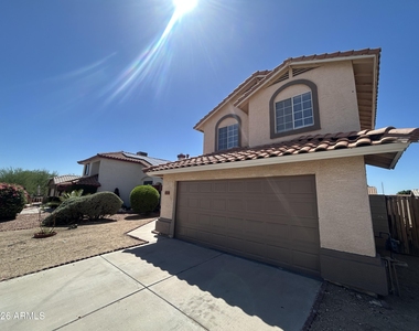 11322 W Alice Avenue - Photo Thumbnail 1