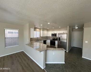 11322 W Alice Avenue - Photo Thumbnail 11