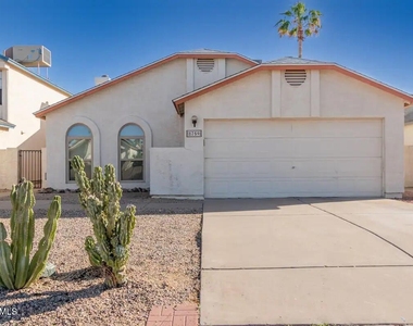 8759 W Grovers Avenue - Photo Thumbnail 1