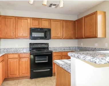 12816 N 122nd Drive - Photo Thumbnail 4