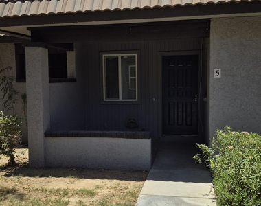 9009 W Elm Street - Photo Thumbnail 1