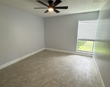 8919 Nw 28th Drive - Photo Thumbnail 2