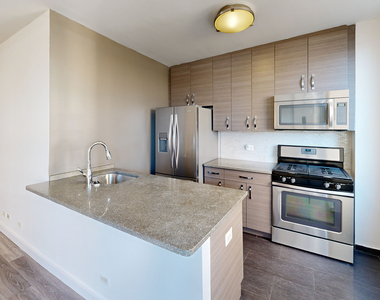 401 E 34th St - Photo Thumbnail 1