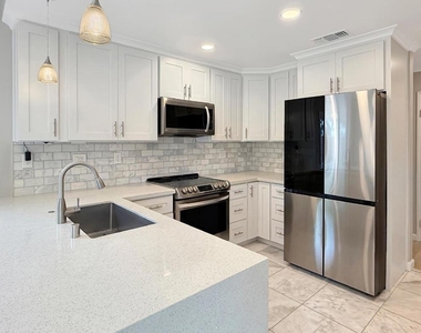 5935 Woodbine Place - Photo Thumbnail 6