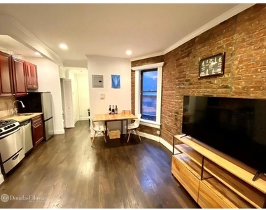 237 E 58th Street - Photo Thumbnail 2