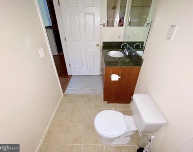 1591 Spring Gate Drive - Photo Thumbnail 3