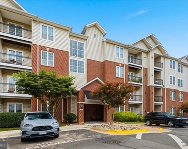 1591 Spring Gate Drive - Photo Thumbnail 1