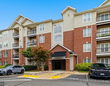 1591 Spring Gate Drive - Photo Thumbnail 3