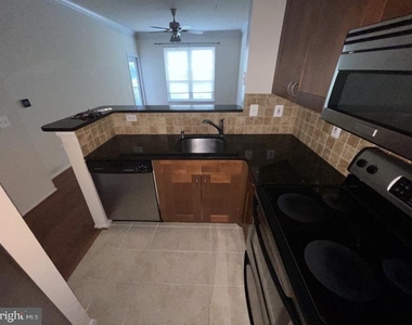 1591 Spring Gate Drive - Photo Thumbnail 1