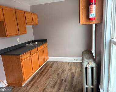 1023 S Queen Street - Photo Thumbnail 1