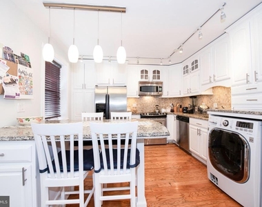 7036 Strathmore Street - Photo Thumbnail 2