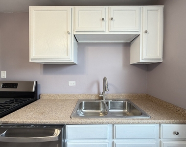 2057 E 72nd Street - Photo Thumbnail 3