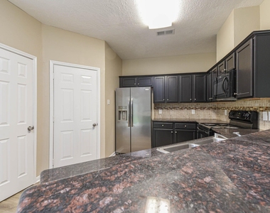 9523 Tallow Tree Drive - Photo Thumbnail 1