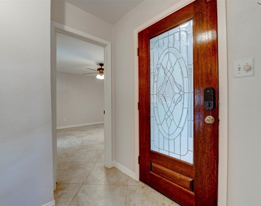 10703 Highland Woods Drive - Photo Thumbnail 2