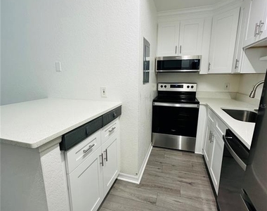 6328 Raleigh Street - Photo Thumbnail 2