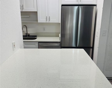 6328 Raleigh Street - Photo Thumbnail 4