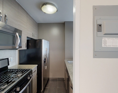 401 E 34th St - Photo Thumbnail 1