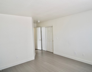 7316 Maiden Run Avenue - Photo Thumbnail 4