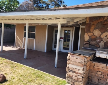 4897 Sawyer Avenue - Photo Thumbnail 1