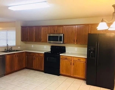 9908 Carter Drive - Photo Thumbnail 2