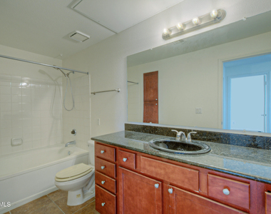 7009 E Acoma Drive - Photo Thumbnail 11