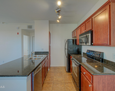 7009 E Acoma Drive - Photo Thumbnail 7