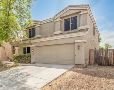 4542 N 111th Drive - Photo Thumbnail 1