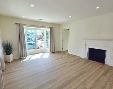 1165 Stanford St - Photo Thumbnail 4
