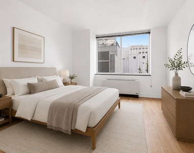 401 E 60th Street - Photo Thumbnail 1