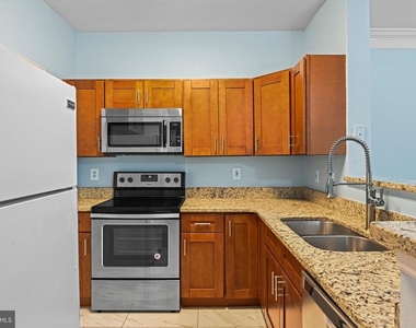 1580 Spring Gate Drive - Photo Thumbnail 6