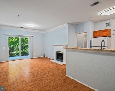 1580 Spring Gate Drive - Photo Thumbnail 2