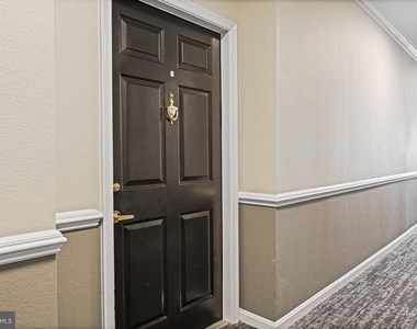 1580 Spring Gate Drive - Photo Thumbnail 1