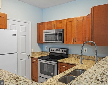 1580 Spring Gate Drive - Photo Thumbnail 5