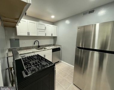 5831 Quantrell Avenue - Photo Thumbnail 1
