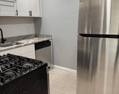 5831 Quantrell Avenue - Photo Thumbnail 3