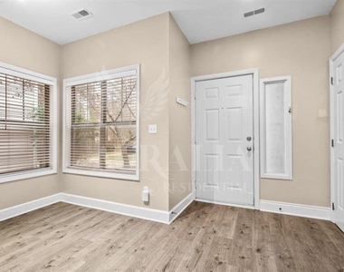6121 Sunpointe Drive - Photo Thumbnail 2