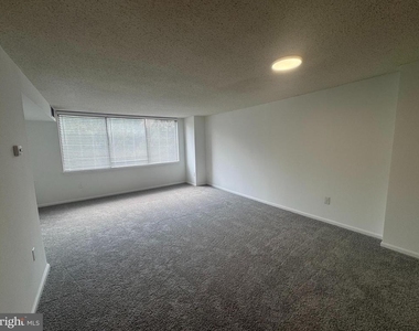10101 Grosvenor Place - Photo Thumbnail 1