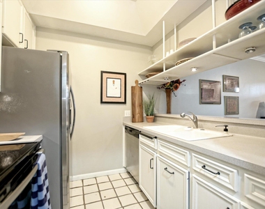 641 W 31st 1/2 St - Photo Thumbnail 2
