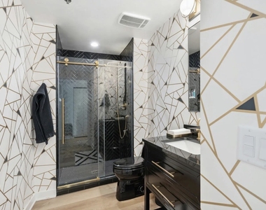 125 E 13th Street - Photo Thumbnail 8